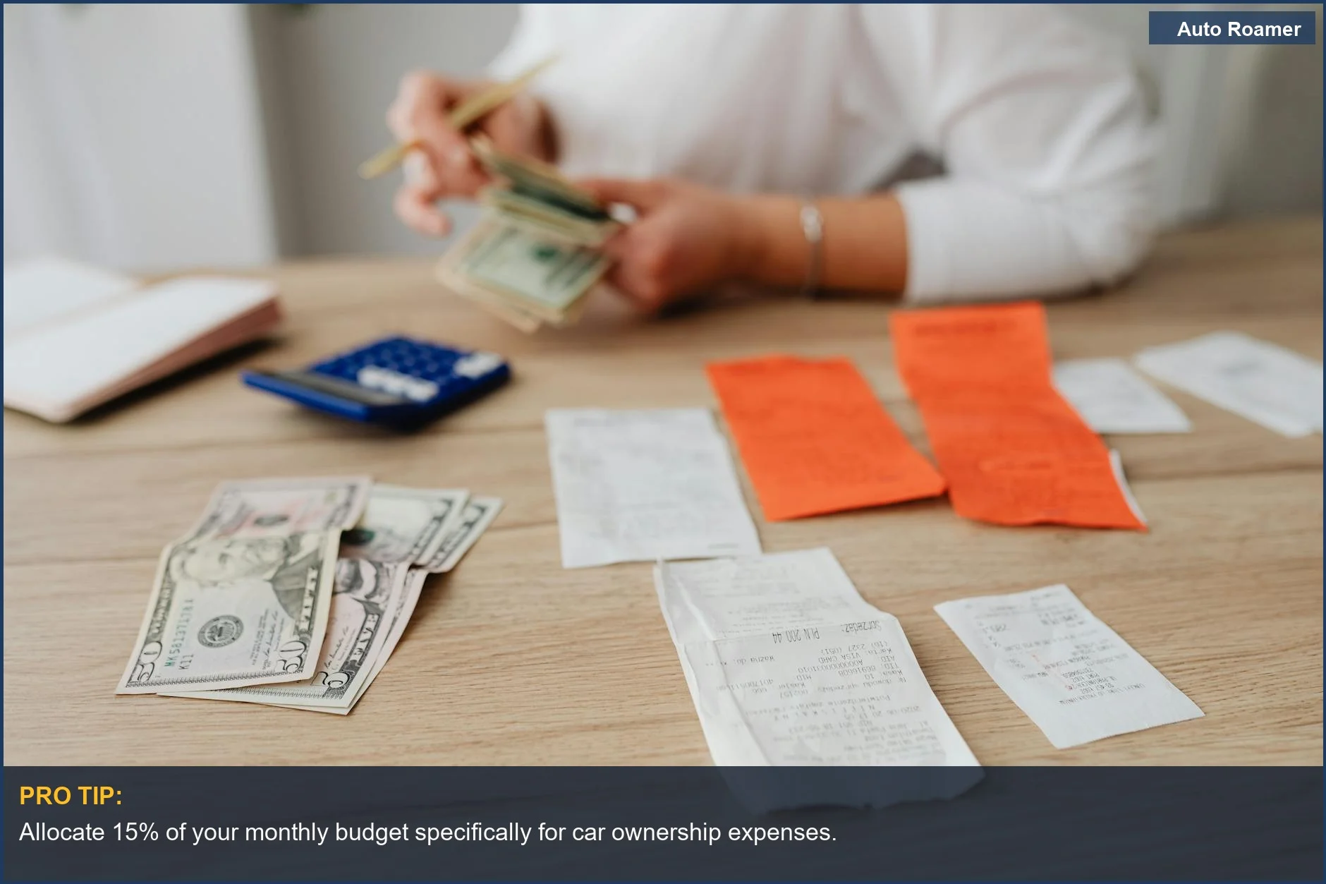Person calculating household budget with cash and calculator, planning car ownership expenses.