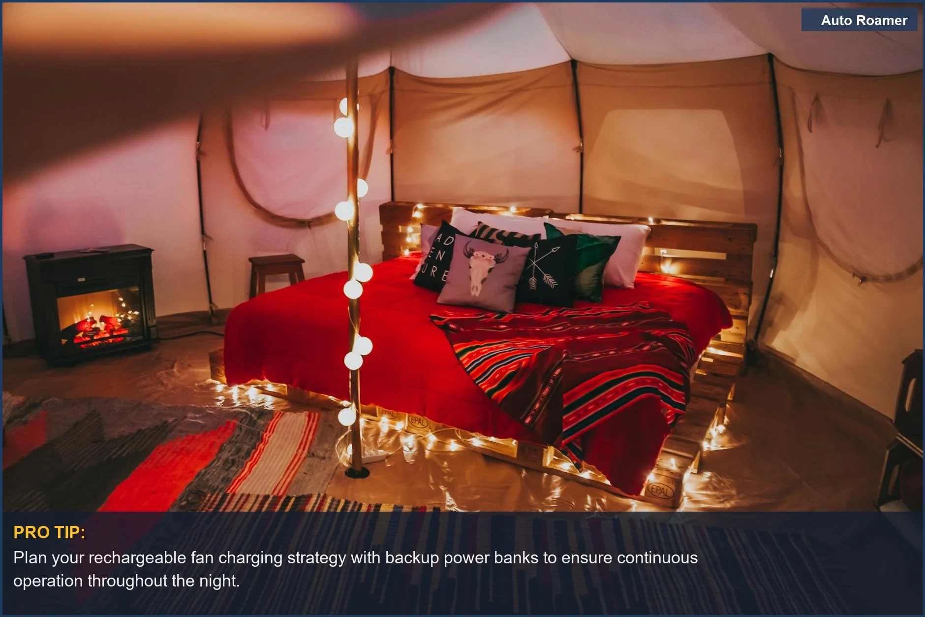 Cozy glamping tent interior with string lights and a USB rechargeable fan for comfort.