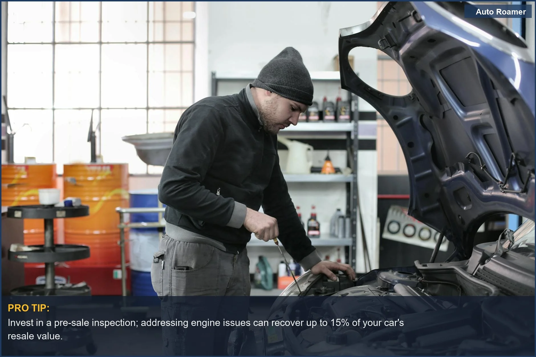 Mechanic inspecting car engine in garage, crucial for assessing vehicle modifications for car camping and resale value.