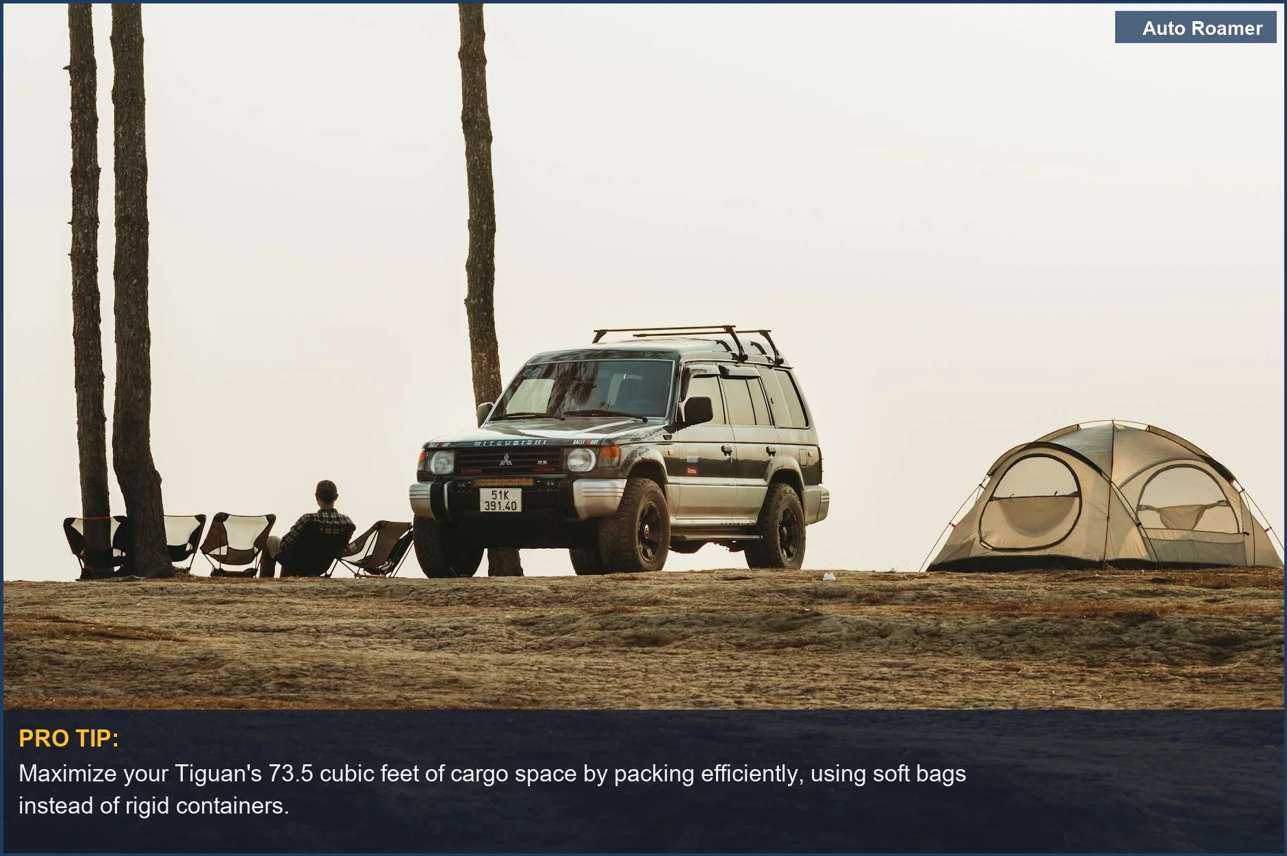 Volkswagen Tiguan car camping setup with tent and chairs amidst tall trees.