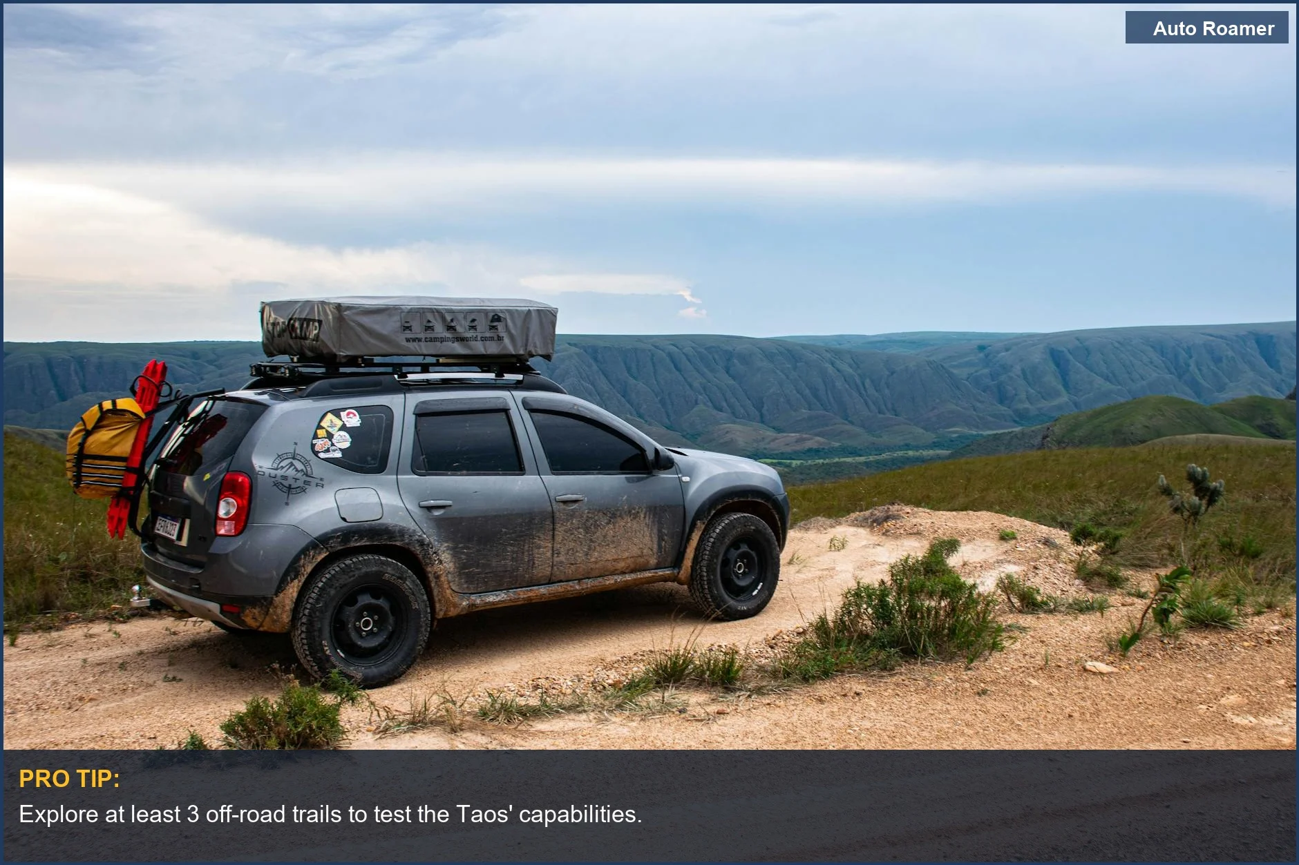 VW Taos navigating a rugged dirt path during an off-road adventure.