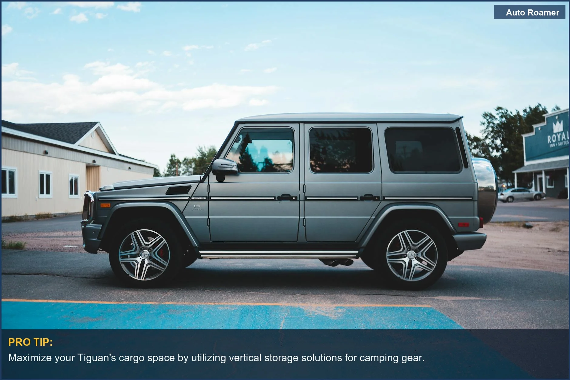 Modern gray VW Tiguan parked in a suburban setting, ready for camping adventures with essential accessories.