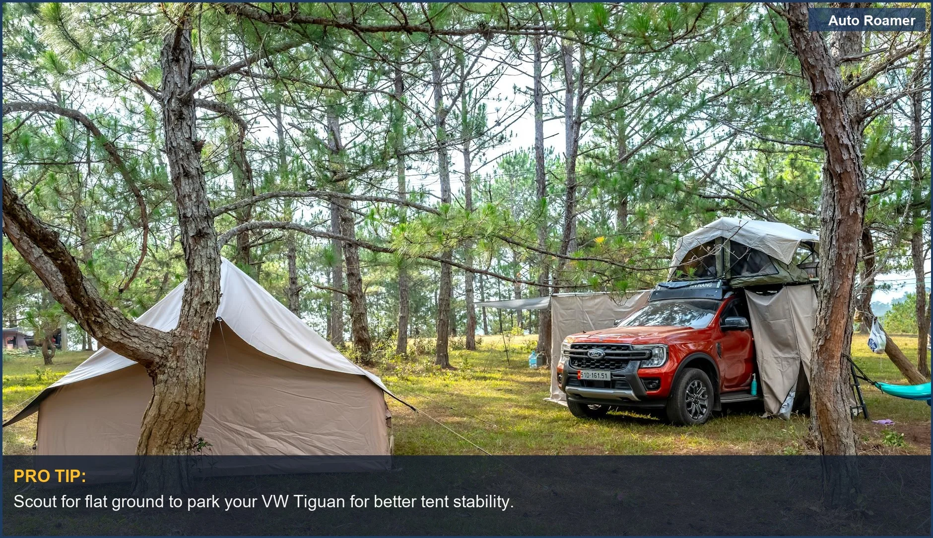 Lush forest scene with tent and vw tiguan rooftop tent for peaceful camping.