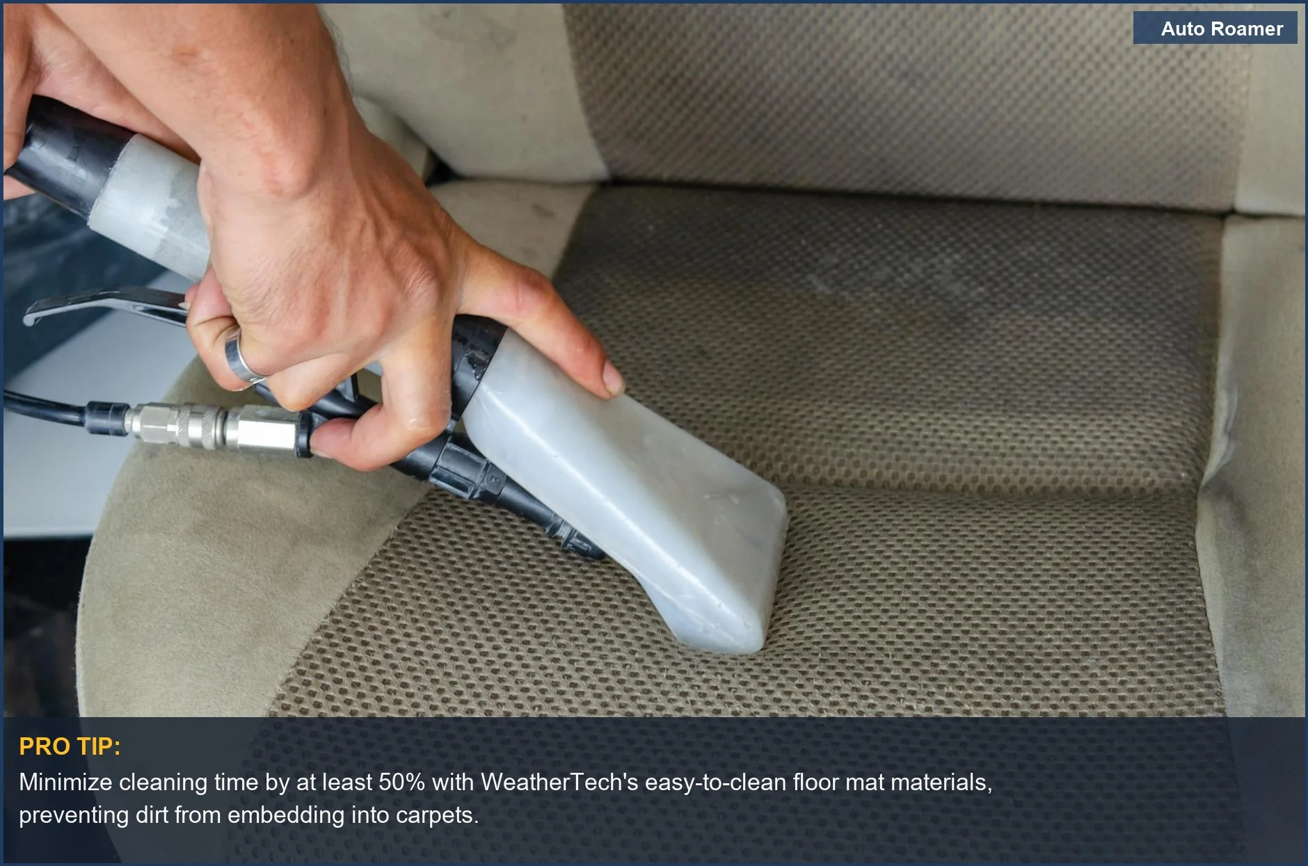Hands vacuuming a dirty car seat, emphasizing the importance of WeatherTech floor mat material comparison for easy cleaning.