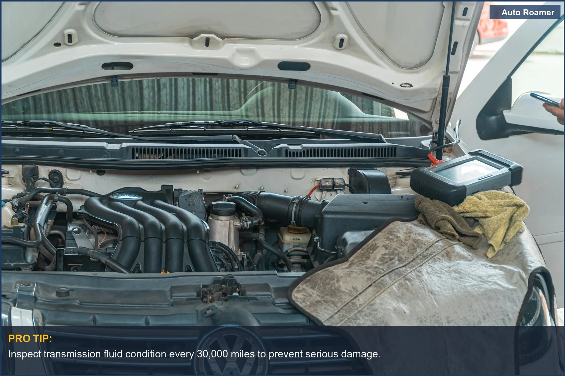Close-up of a car engine repair, highlighting the risks of skipping transmission fluid changes.
