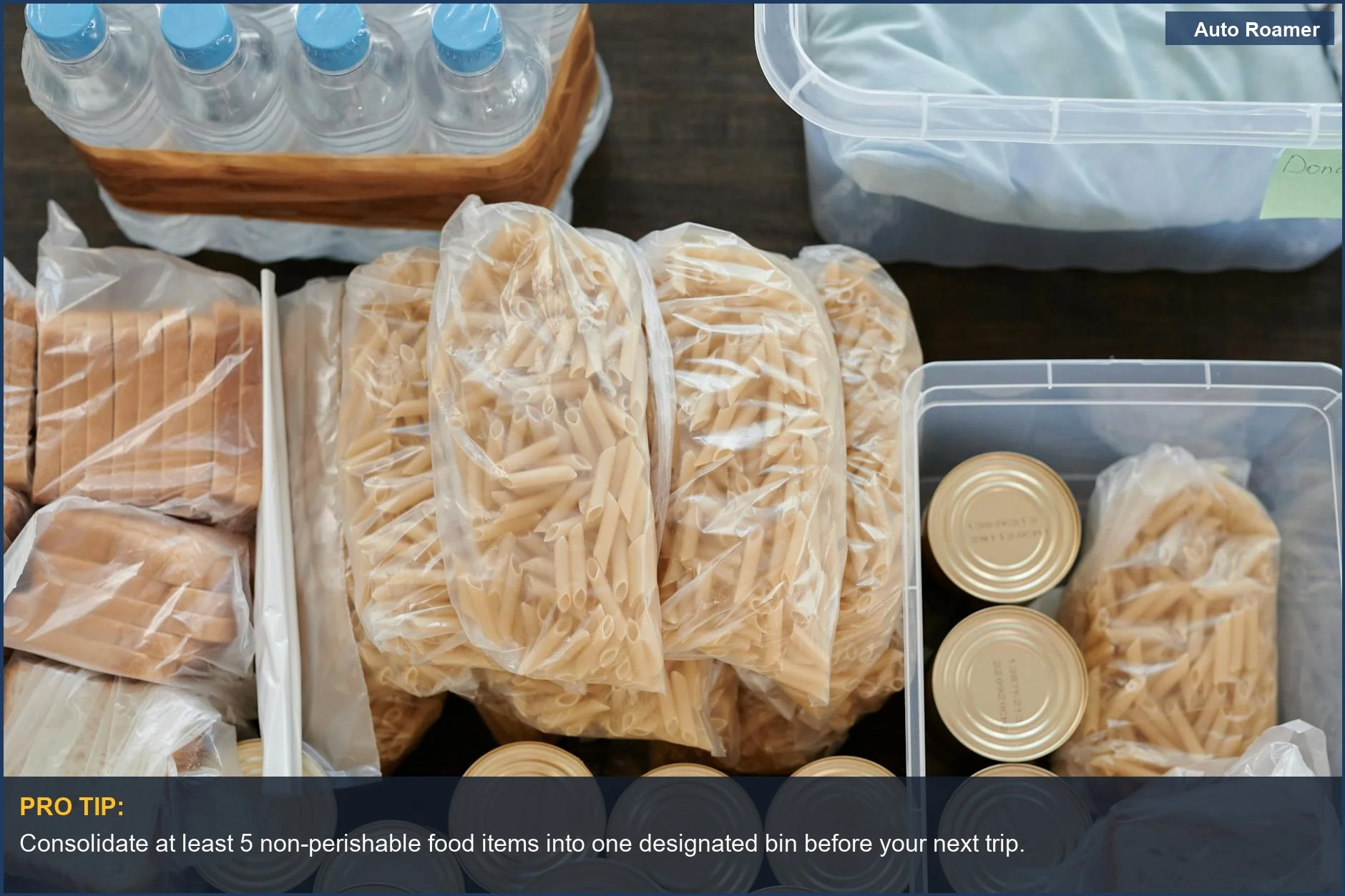 Aerial view of car camping pantry essentials like pasta and canned goods organized in bins for a bulk plan.