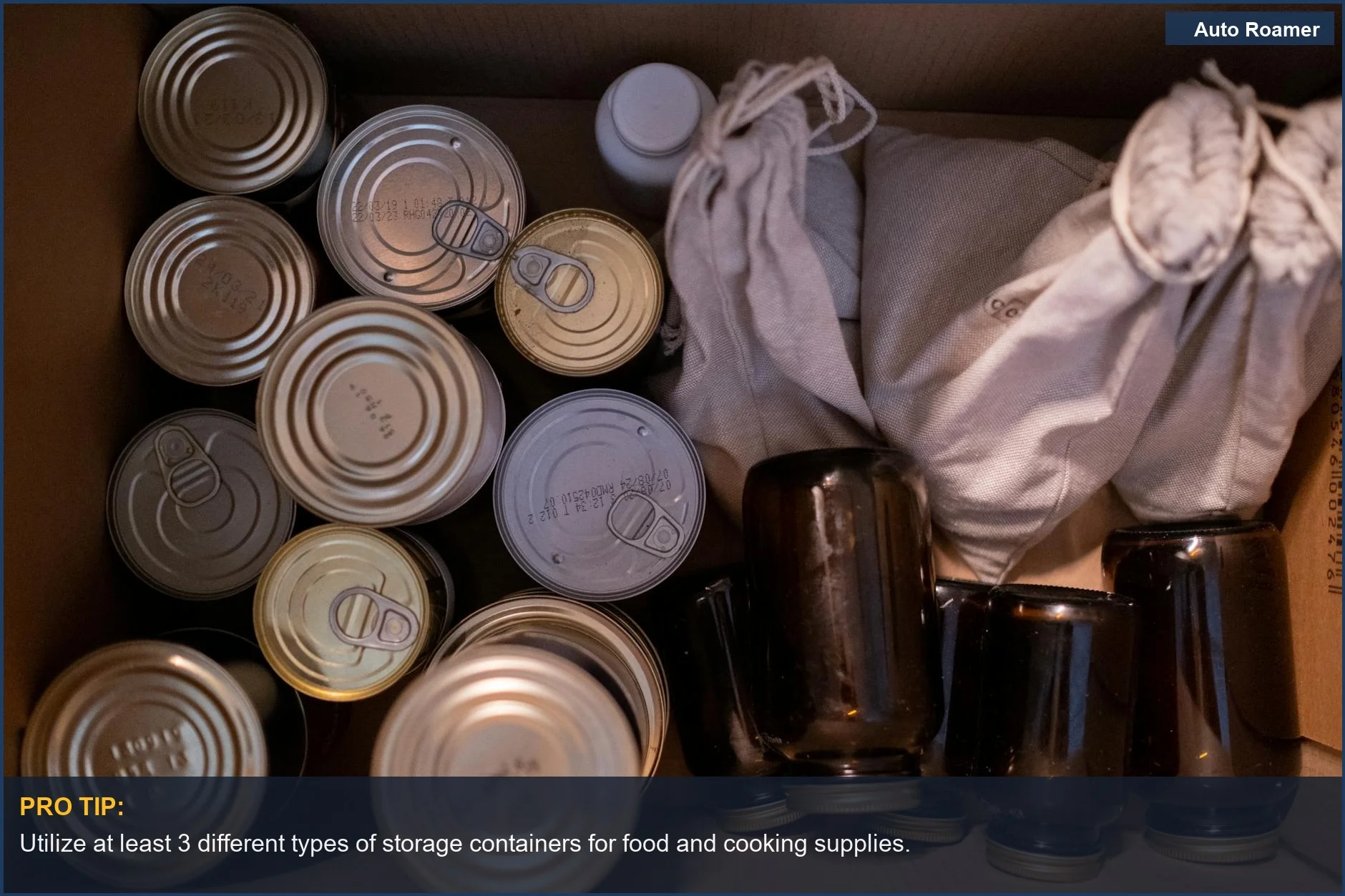 Top view of a storage box filled with canned goods and cloth sacks, ideal for a car camping bulk plan.