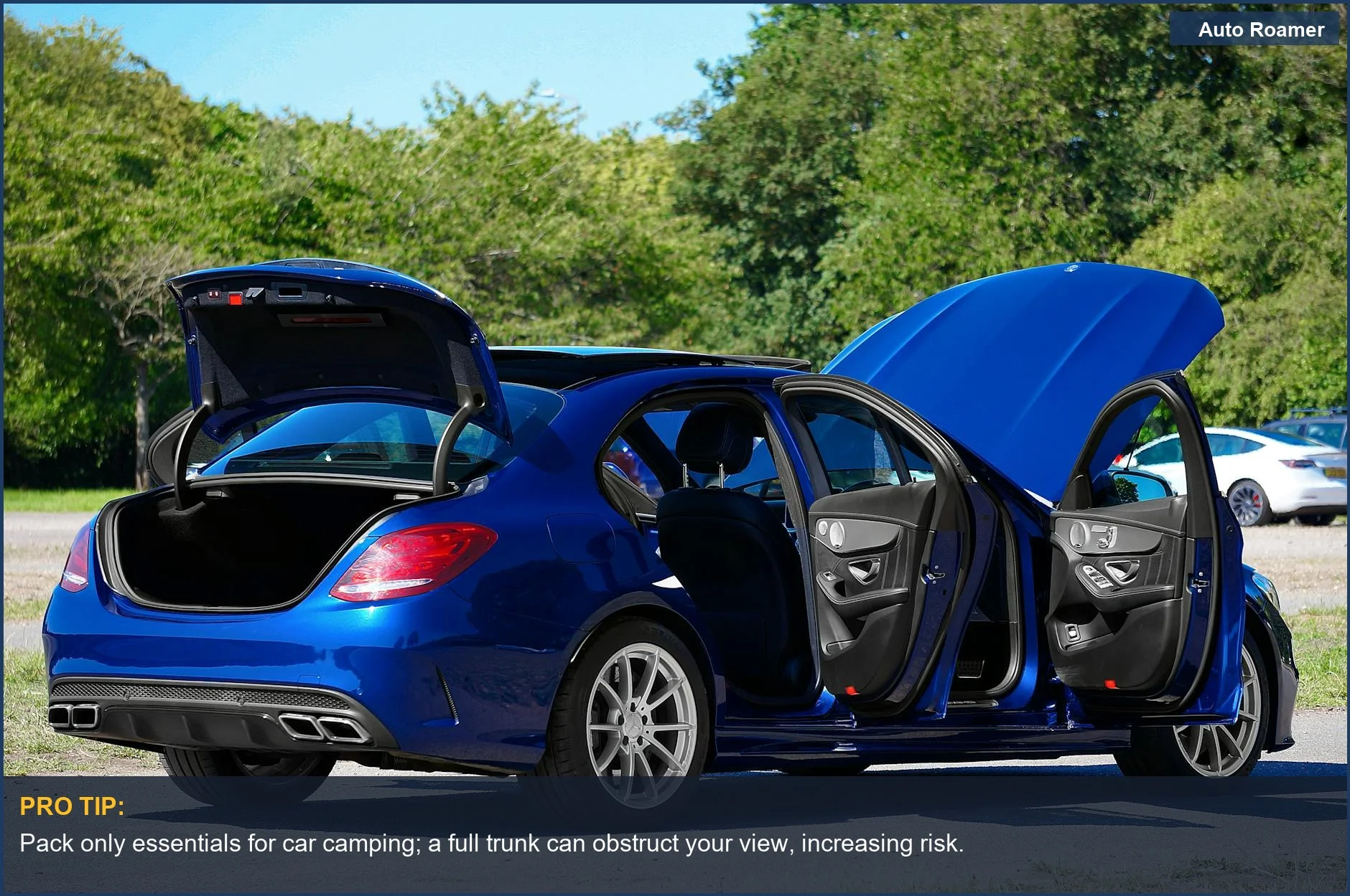 Sleek blue Mercedes-Benz AMG C63 with trunk open, showing how dash cam parking mode works even when the car is packed.
