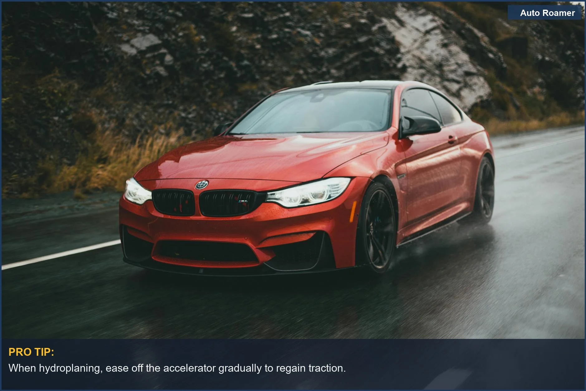 Red BMW sports car driving on a wet road, exemplifying speed and luxury while facing hydroplaning.