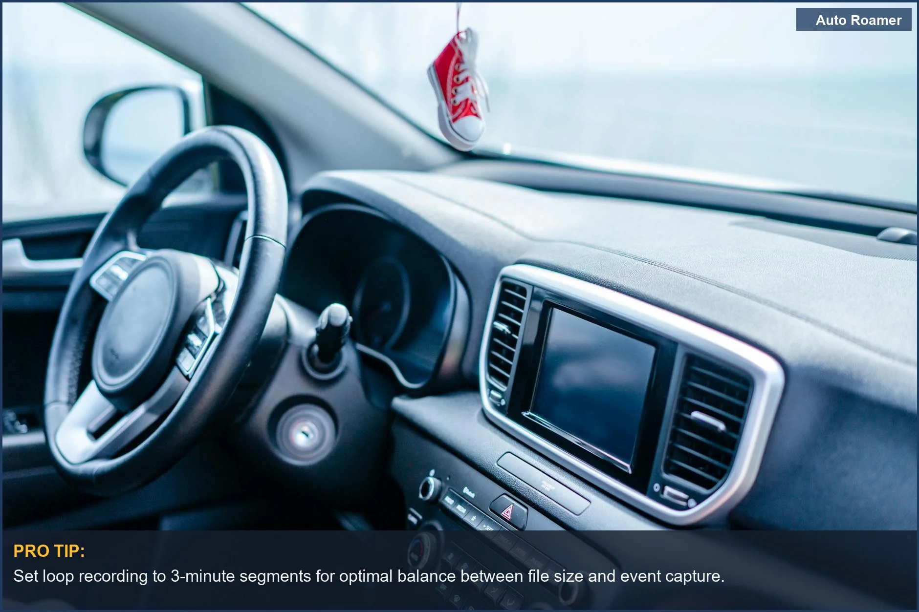 Modern car interior with focus on steering wheel and dashboard, illustrating dash cam loop recording.