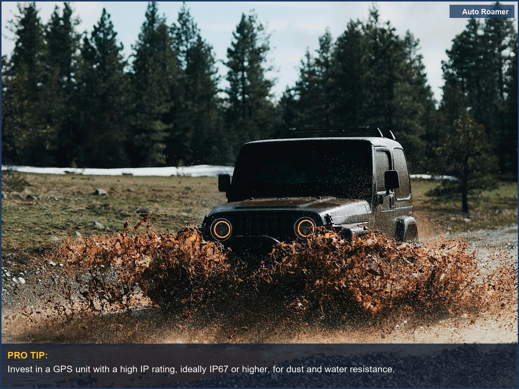 Modern all-terrain vehicle driving through a muddy puddle, kicking up water on a cloudy day.