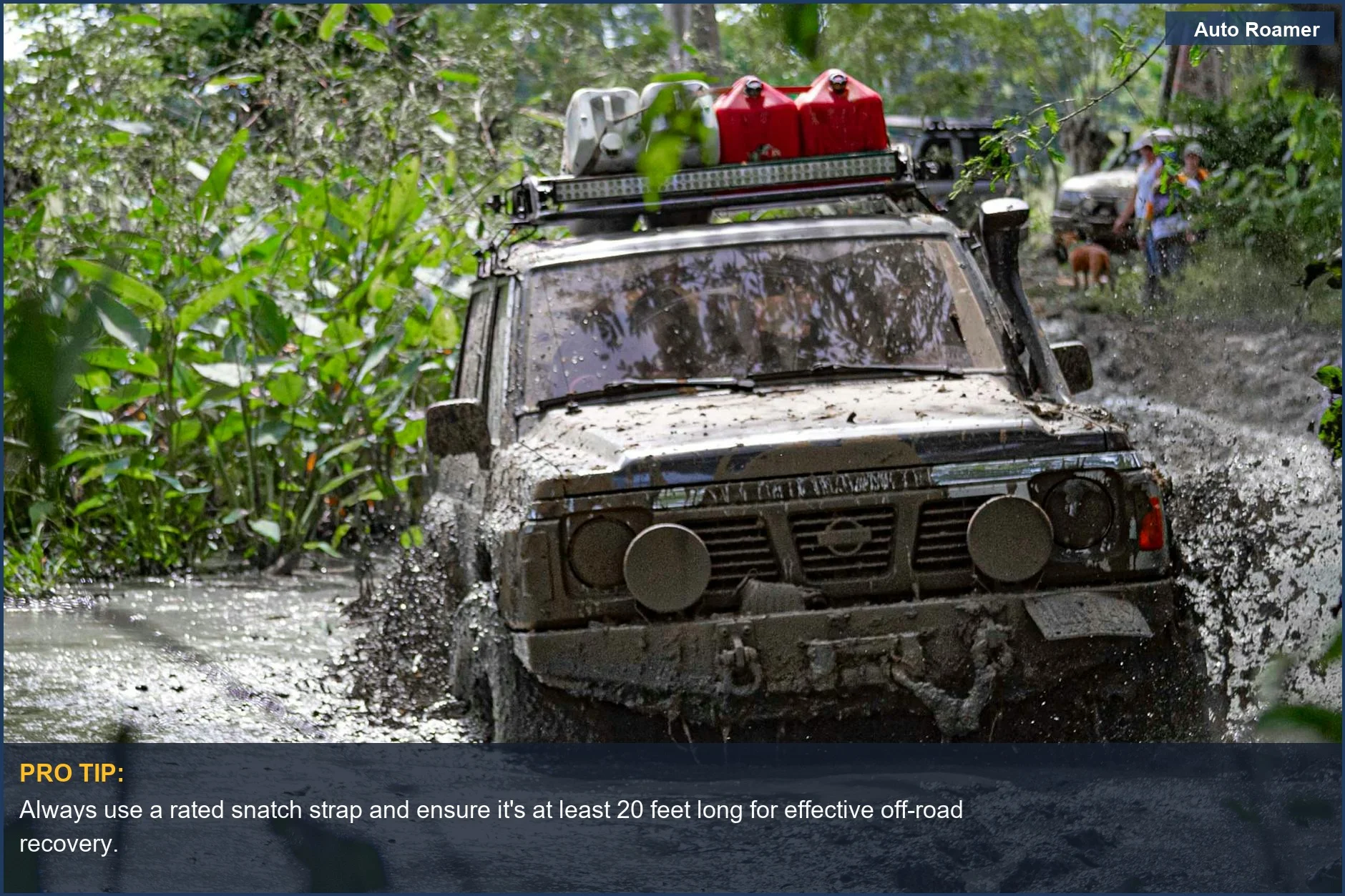 4x4 vehicle navigating a muddy trail, demonstrating the need for off-road recovery gear.