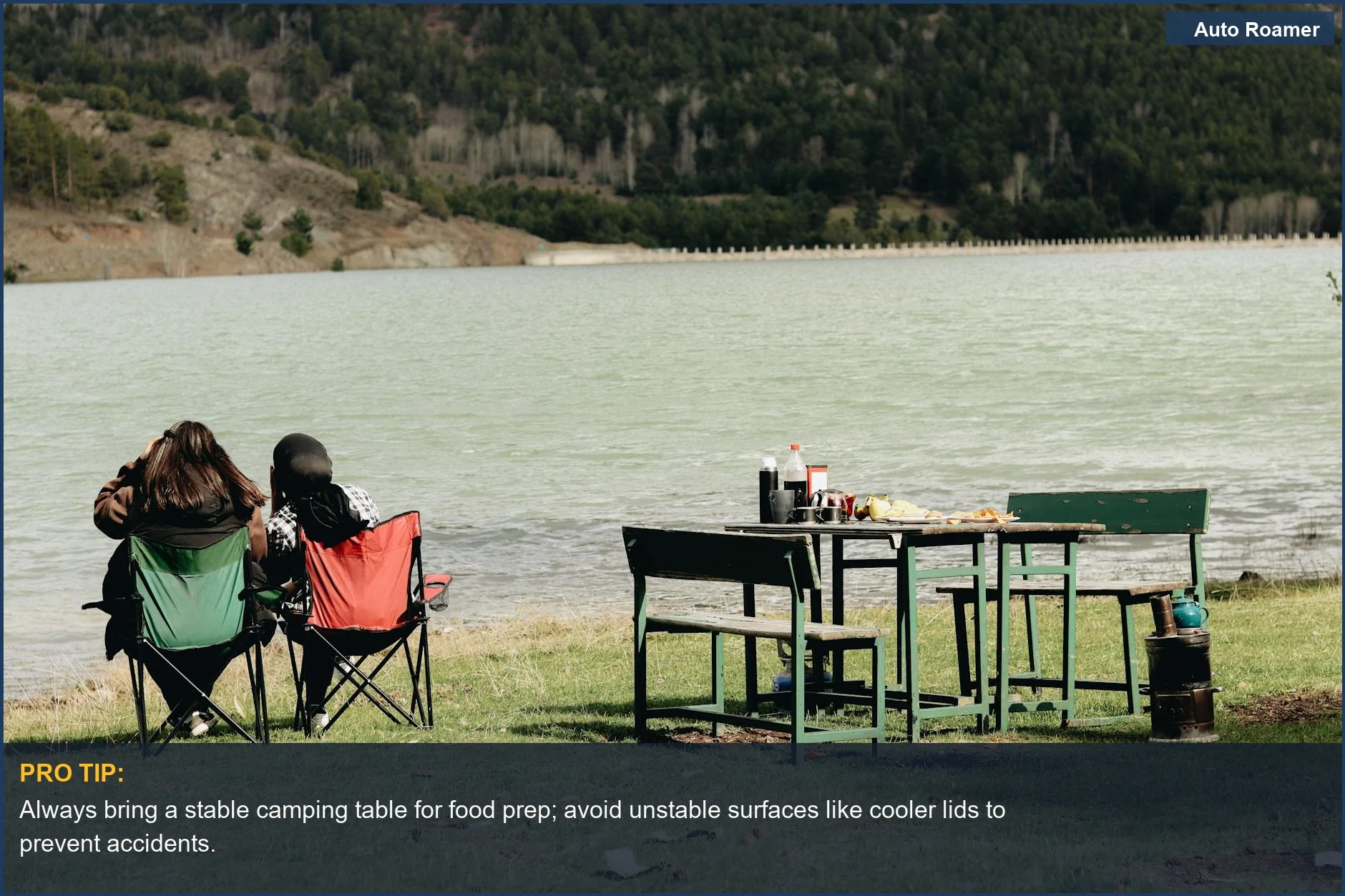 Two women enjoying a picnic by a lake with a folding camping table, illustrating the need for prep space.