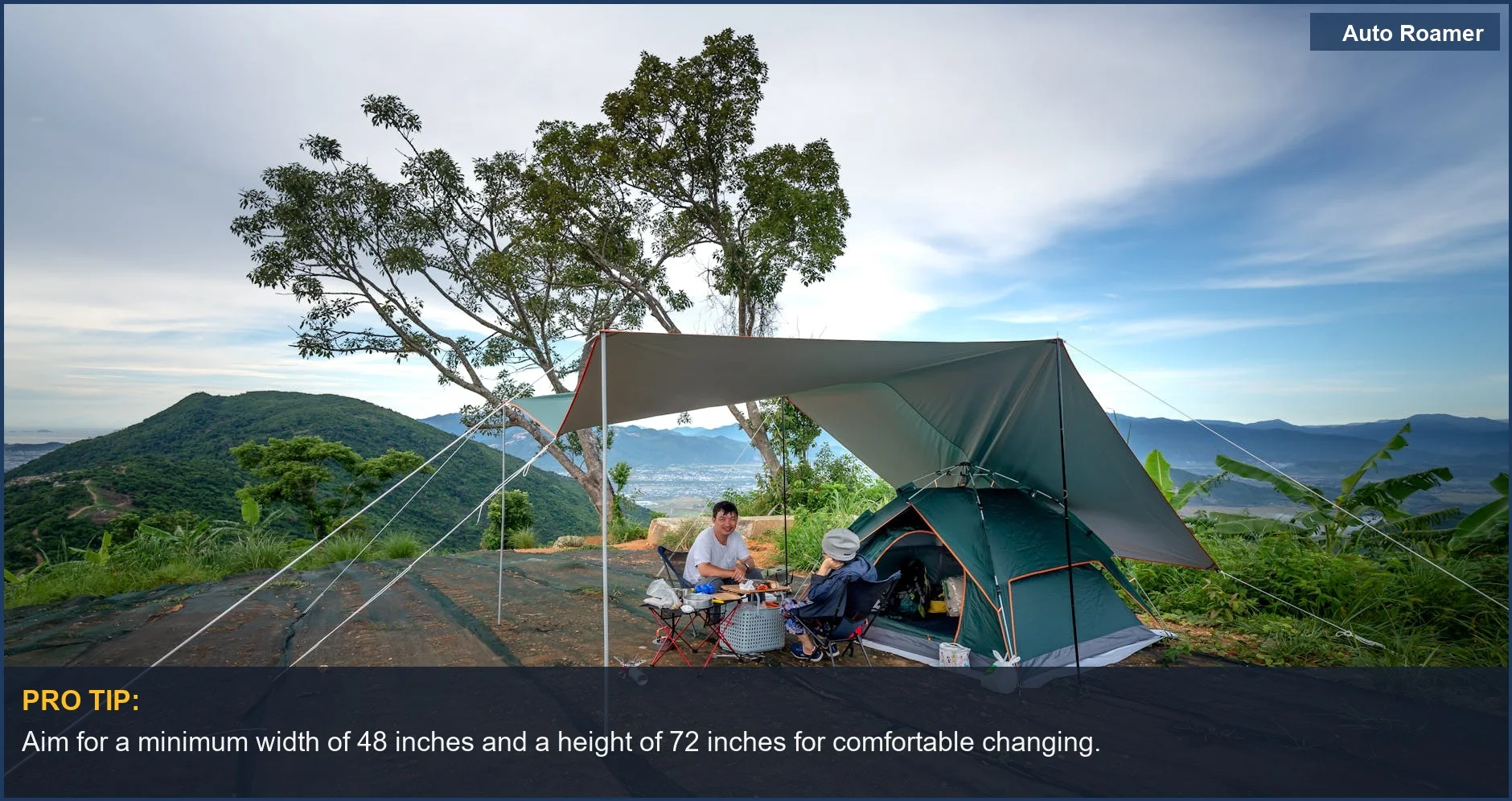 Spacious car camping shower tent setup in a scenic mountain landscape, illustrating ideal car camping shower tent size.