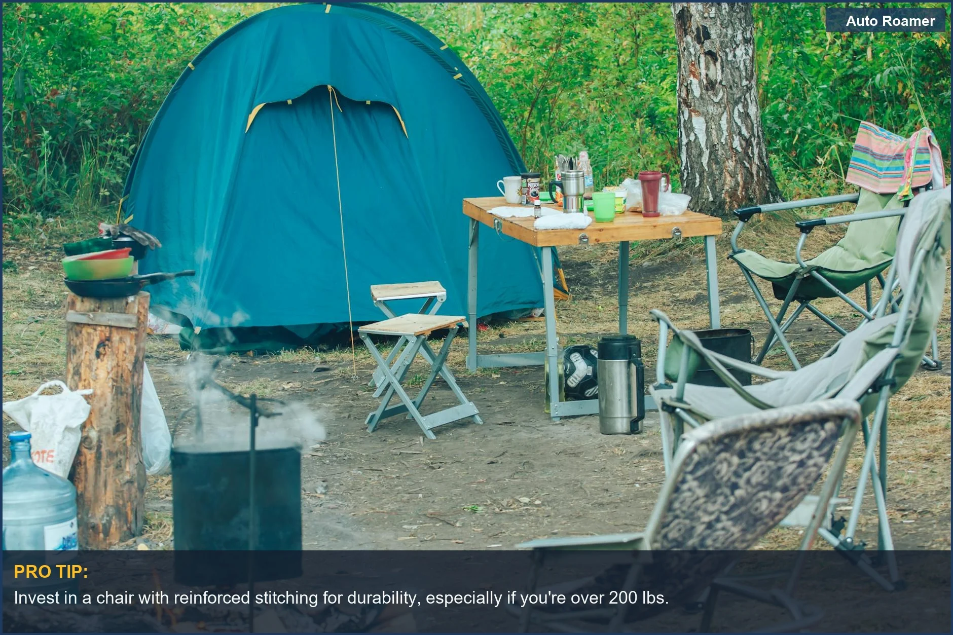 Serene campsite with a comfortable portable camping chair, tent, and campfire for car camping adventures.