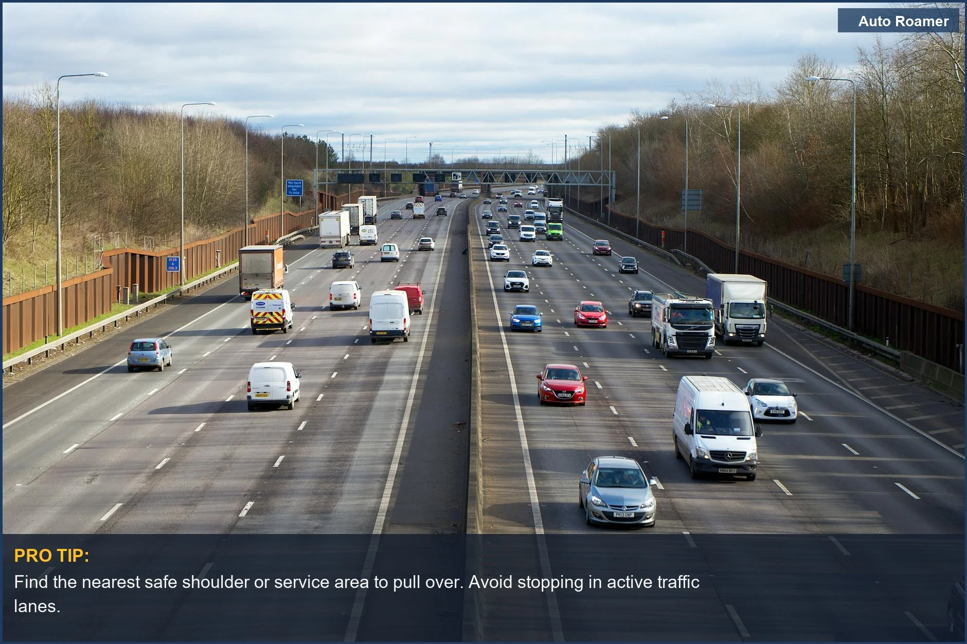 Aerial view of highway traffic, highlighting the importance of pulling over safely when a car overheats.