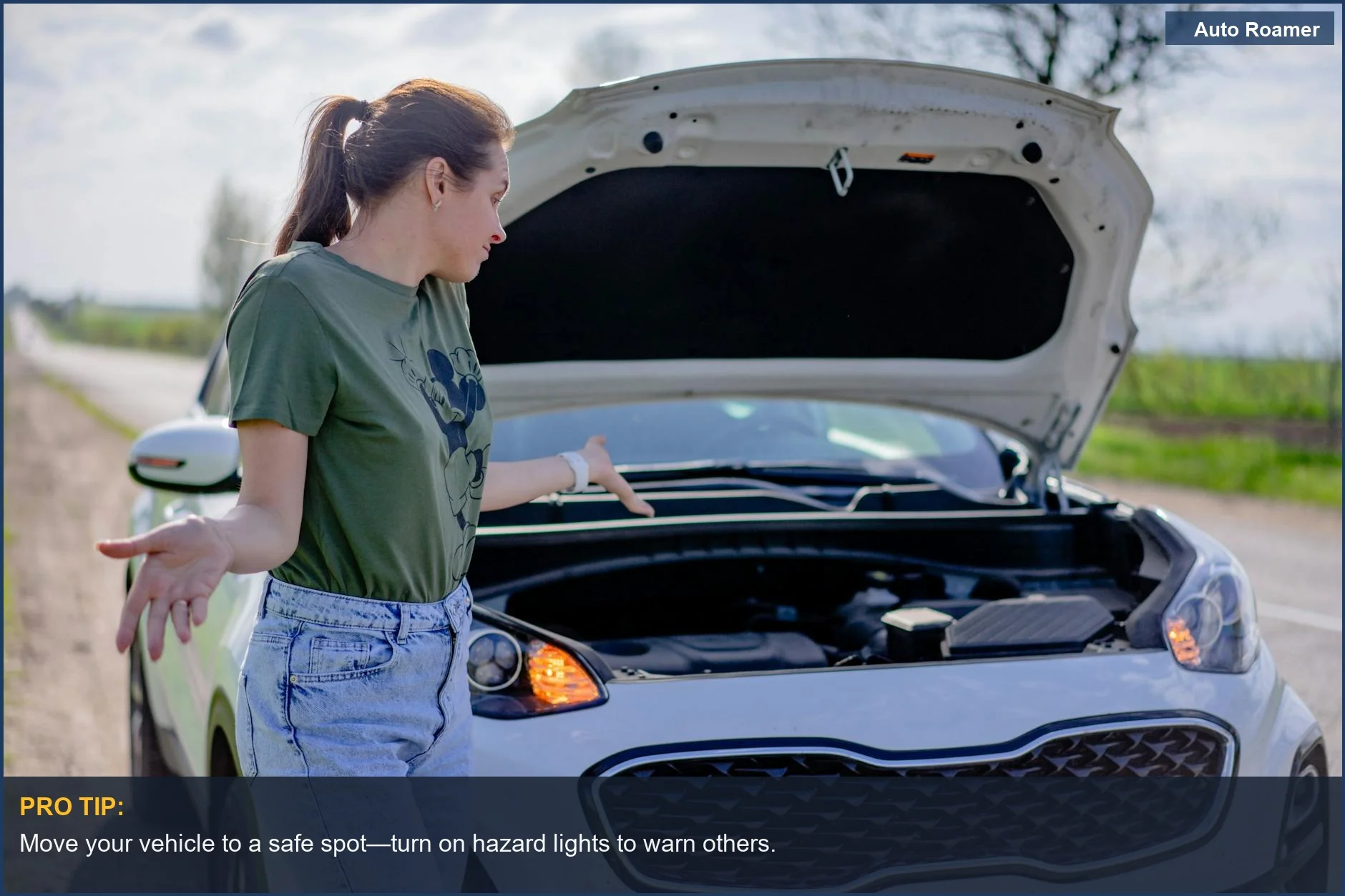 Confused woman examines her car with an open hood on a rural road.