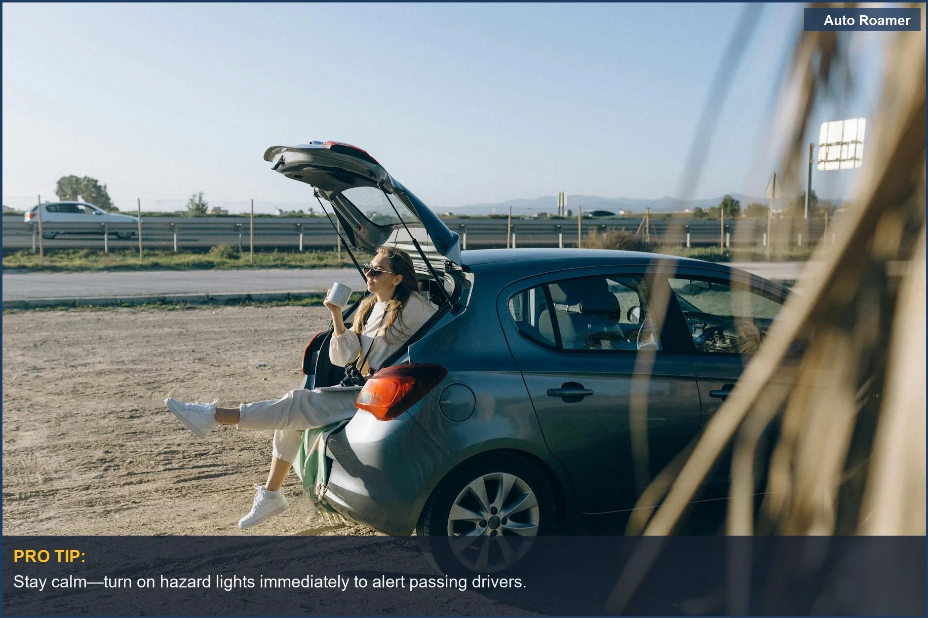 Woman resting in car trunk on a sunny day after car ran out of gas.