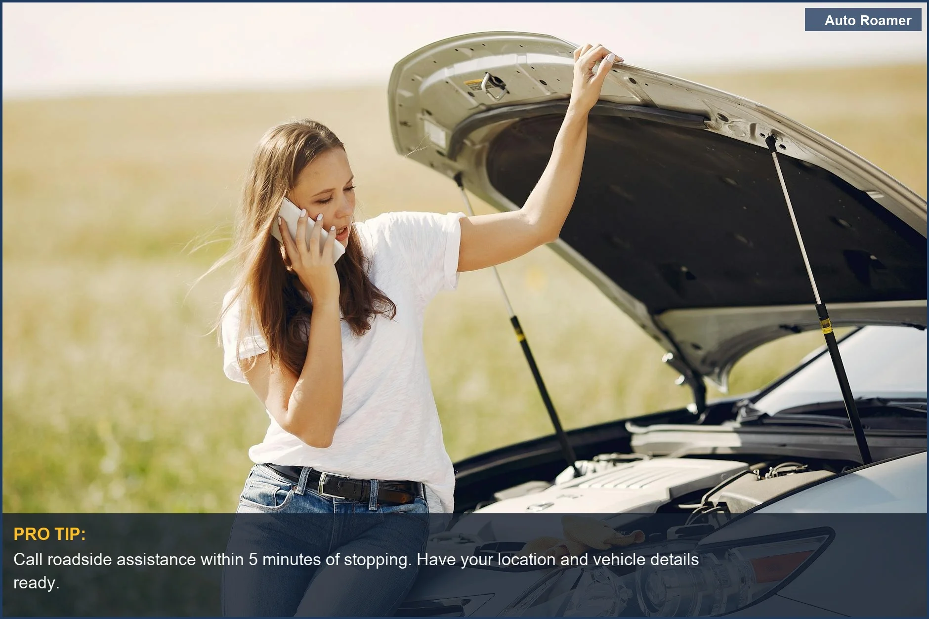 Young woman on phone seeking assistance for a car breakdown on a bright, sunny day.
