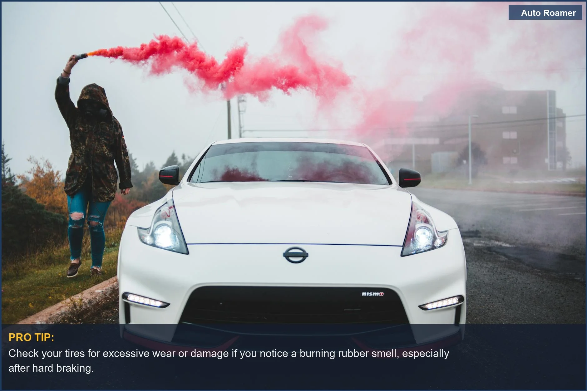 White sports car with red smoke flare, indicating a critical warning sign for car smells like burning rubber.