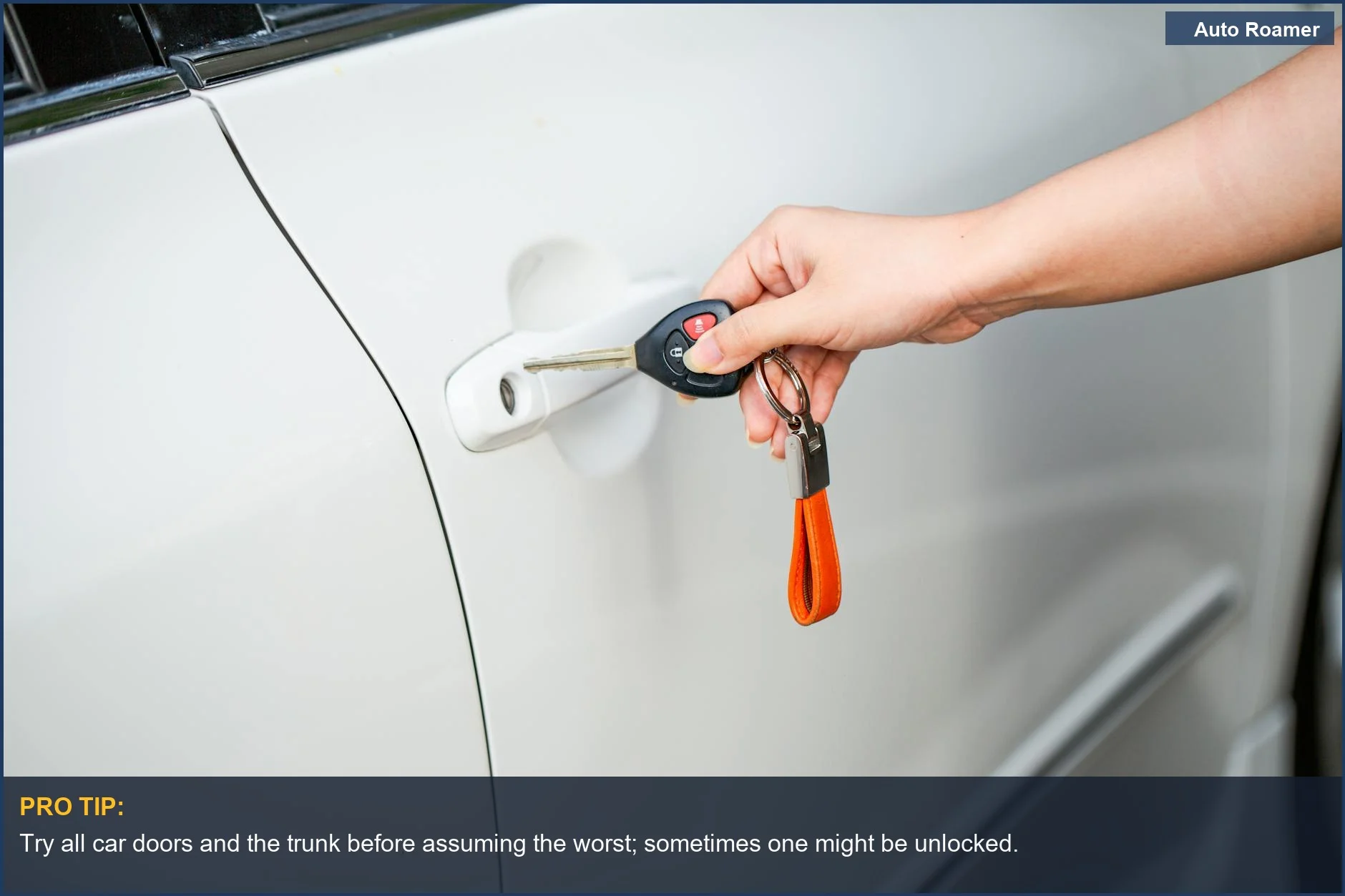 Close-up of a hand using a metal car key to unlock a white car door with a key fob attached.