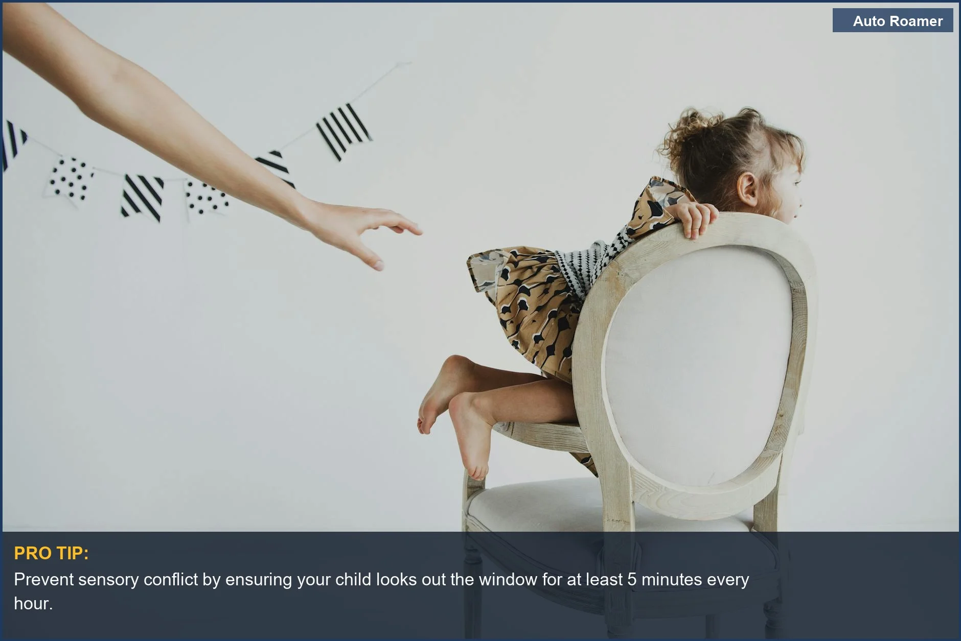 Child looking away from screen, a key to preventing carsickness when traveling with kids.