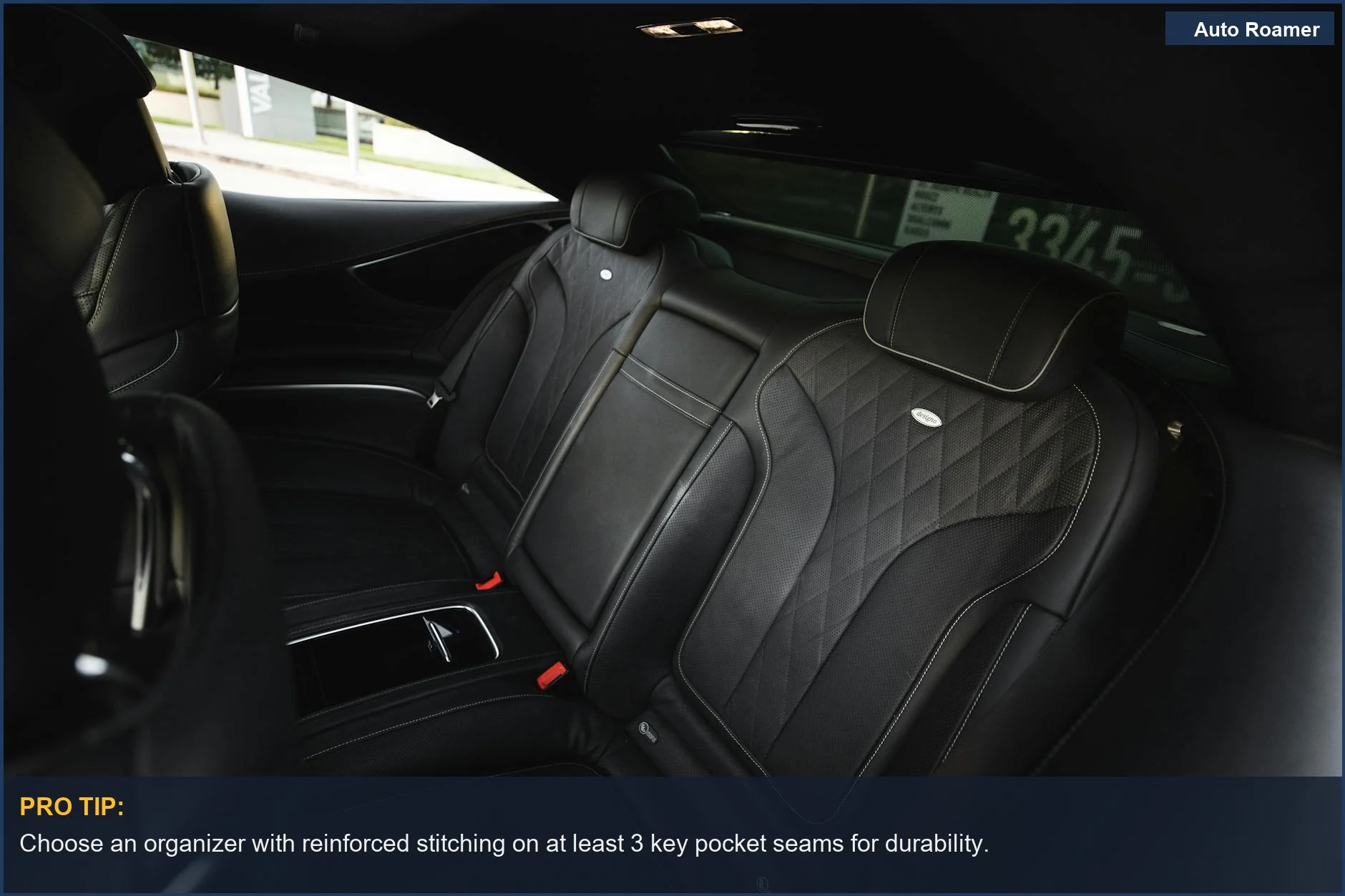 Luxury car interior with black leather seats, showcasing the sleek look of a good backseat organizer.