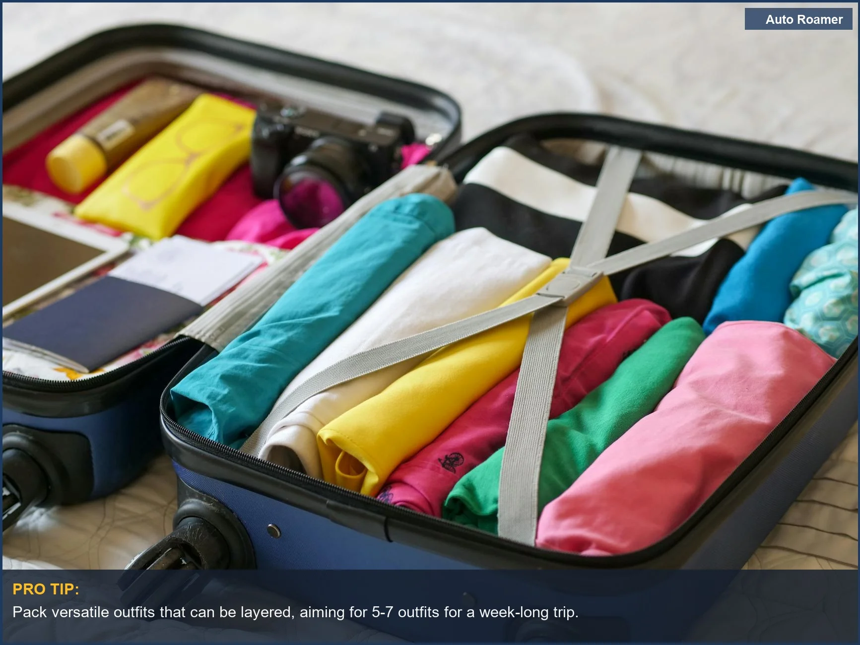 Open suitcase neatly packed with colorful baby clothes and travel essentials for a smooth trip.