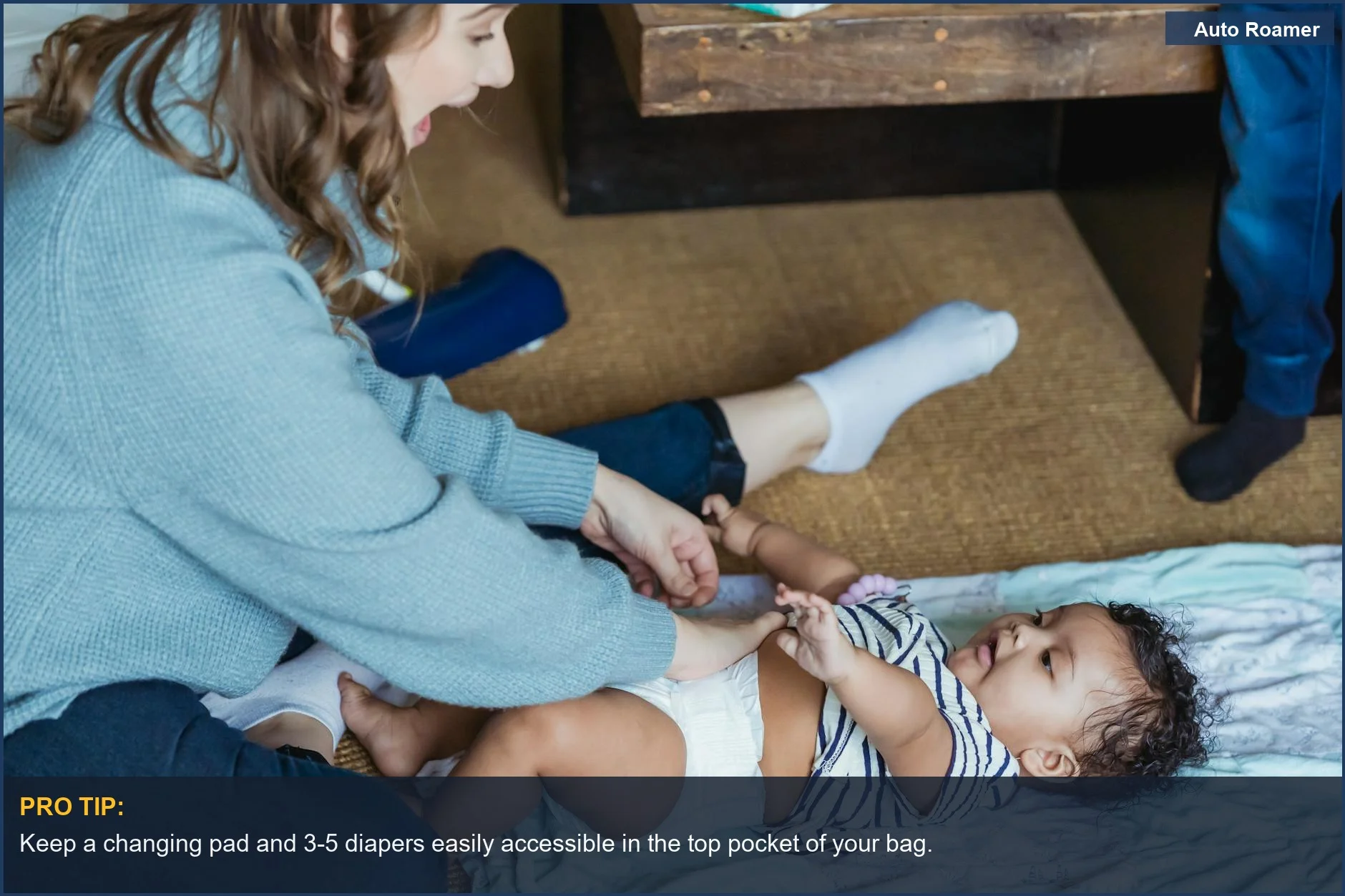 Mother changing baby's diaper on a soft linen mat, illustrating quick changes with a diaper bag checklist.