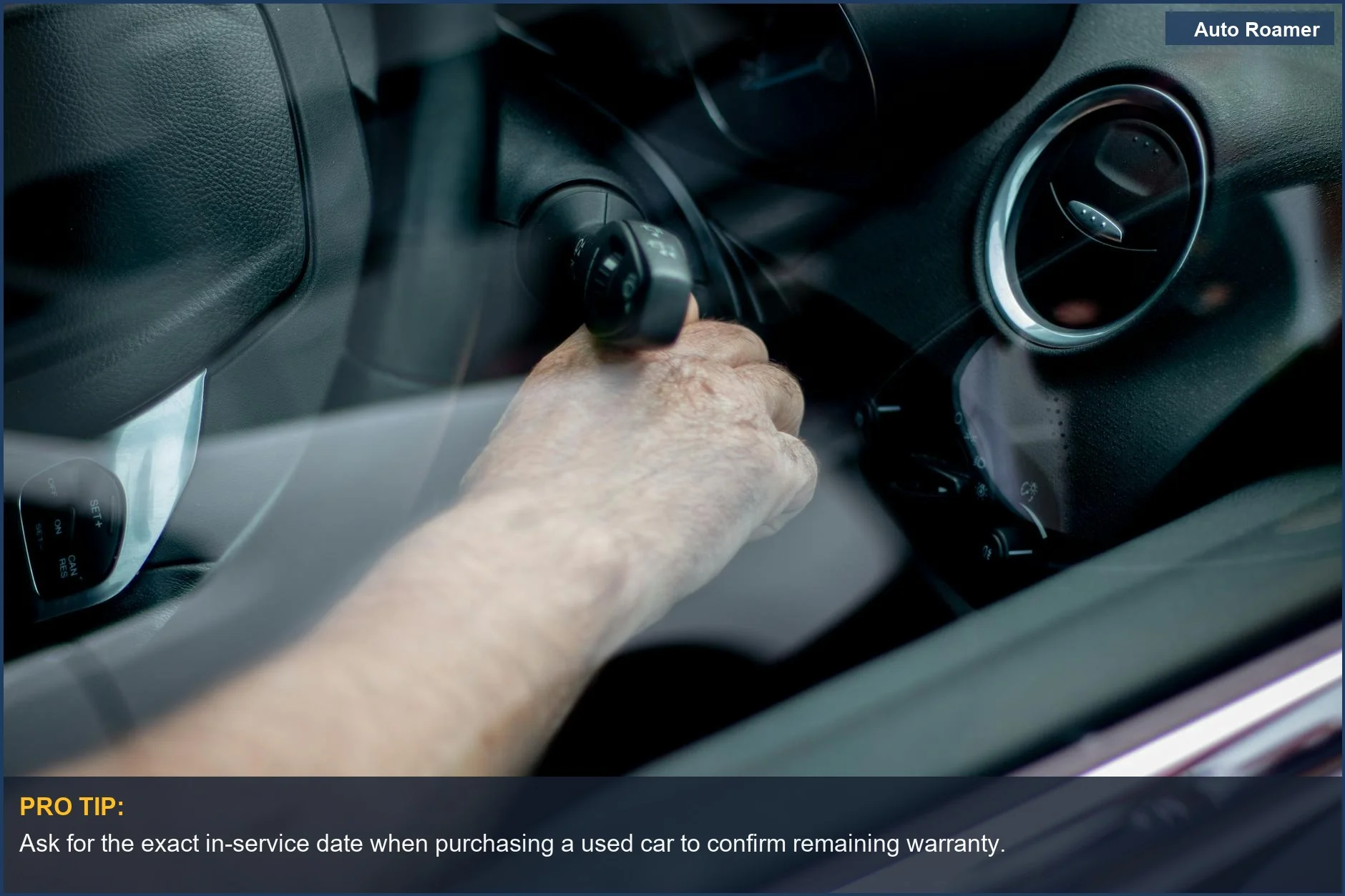 Driver's hand turning ignition key in car, understanding new car warranty start dates is crucial.