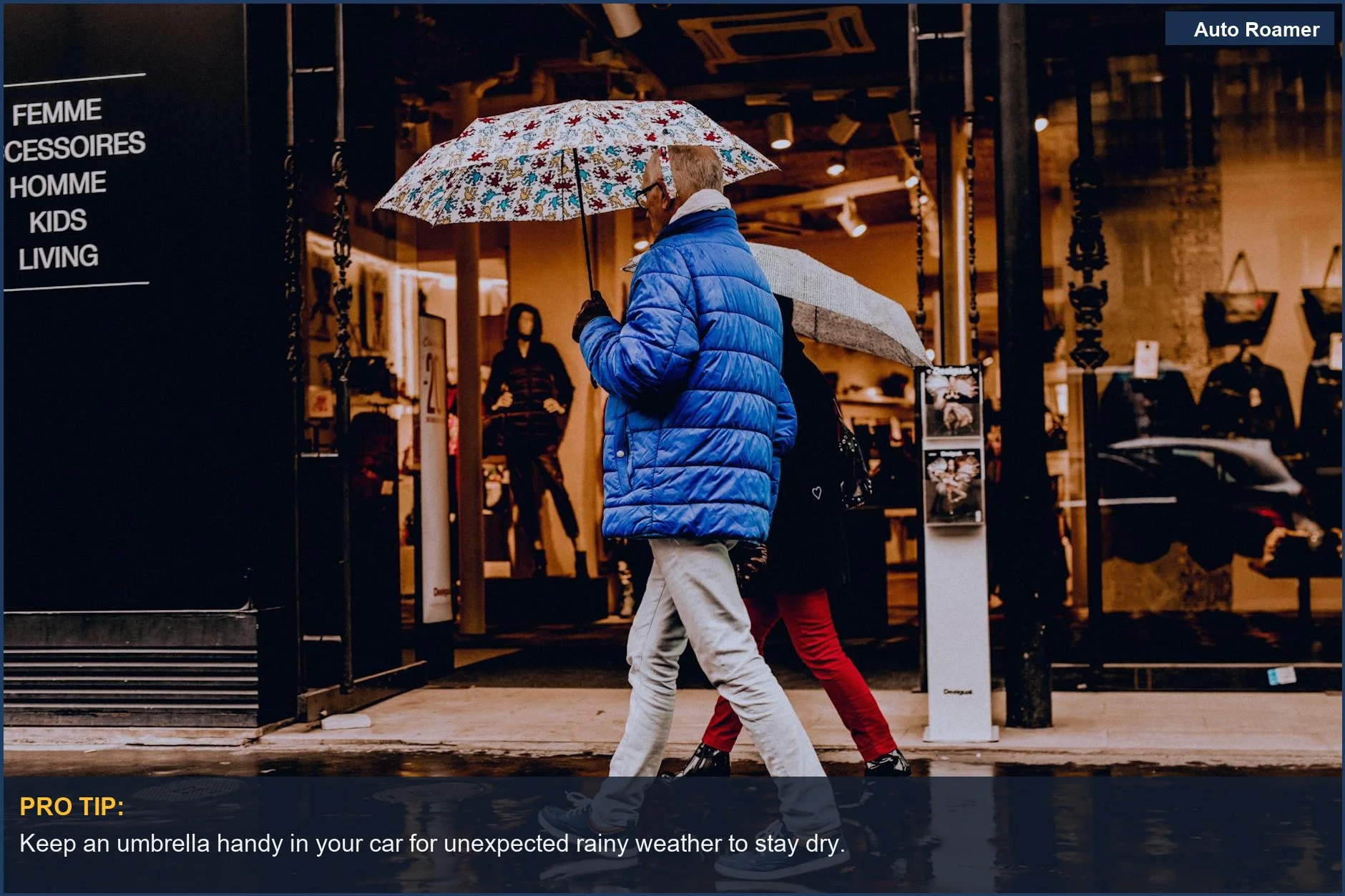 People walking with umbrellas on a rainy city street in winter.