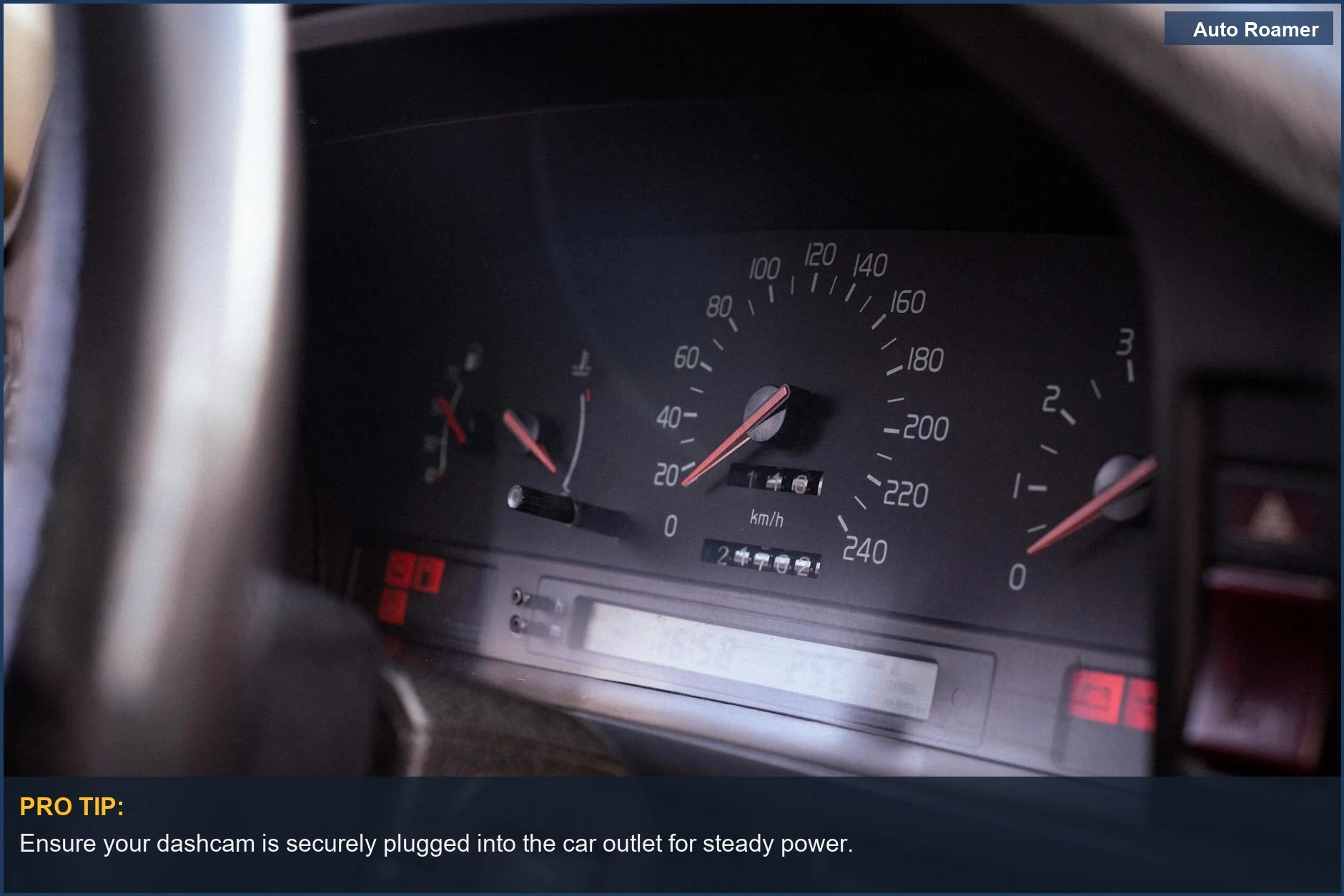 Interior shot of a car's speedometer and dashboard controls, demonstrating driver focus.
