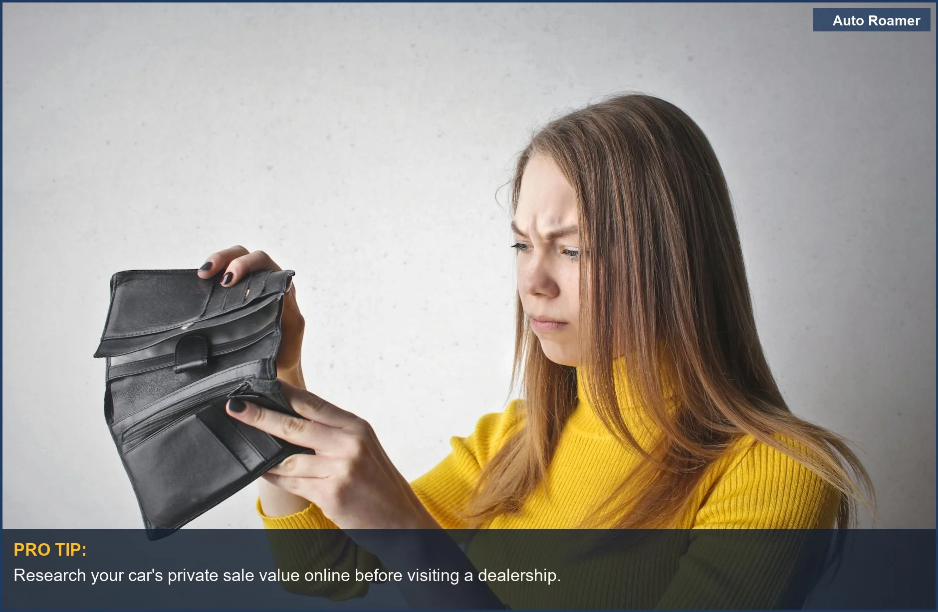 Frustrated woman with an empty wallet shows the budget realities of car trade-ins.