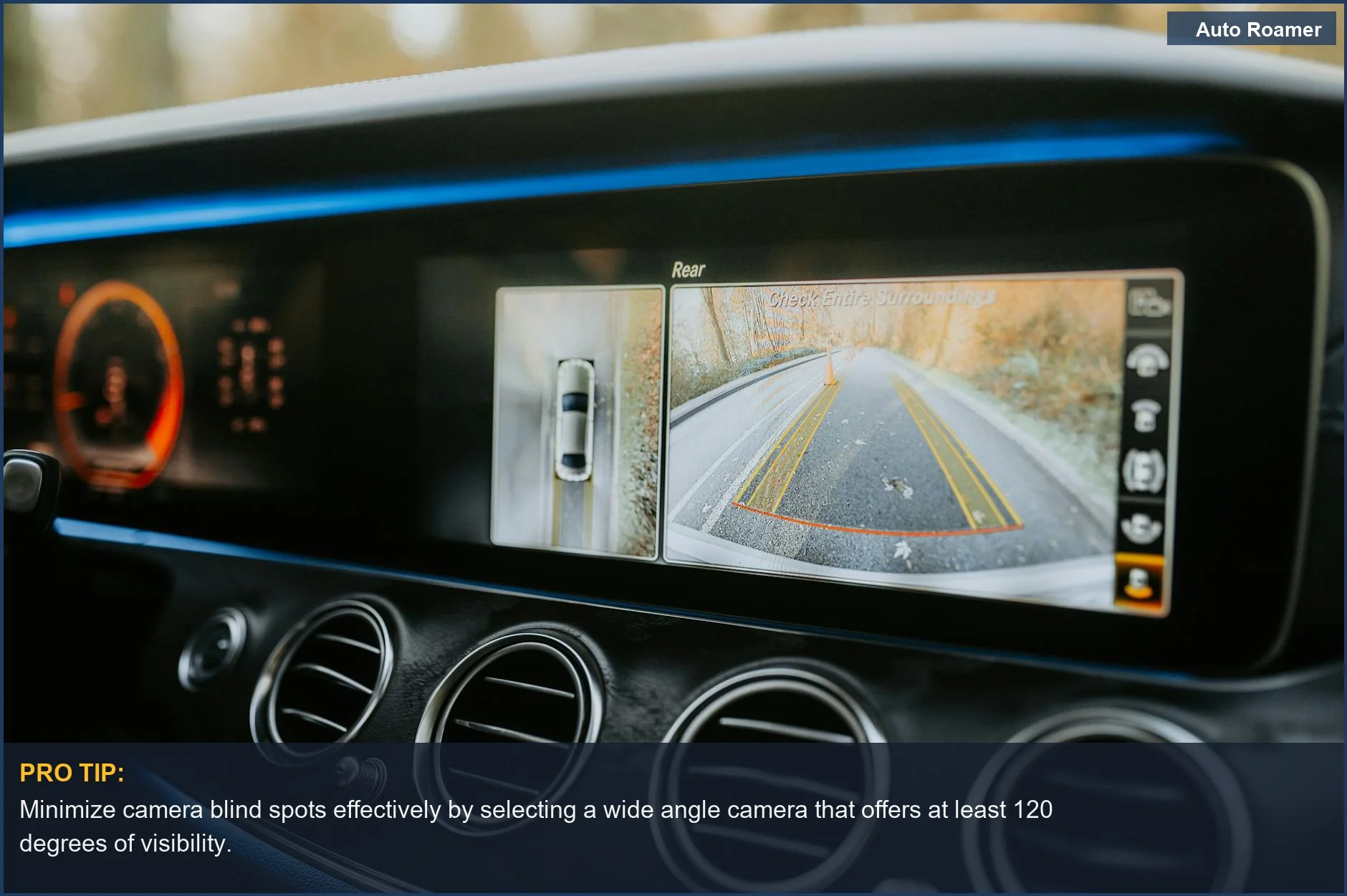 Modern car dashboard with a clear rear-view camera screen, highlighting camera blind spots and wide angle camera benefits.