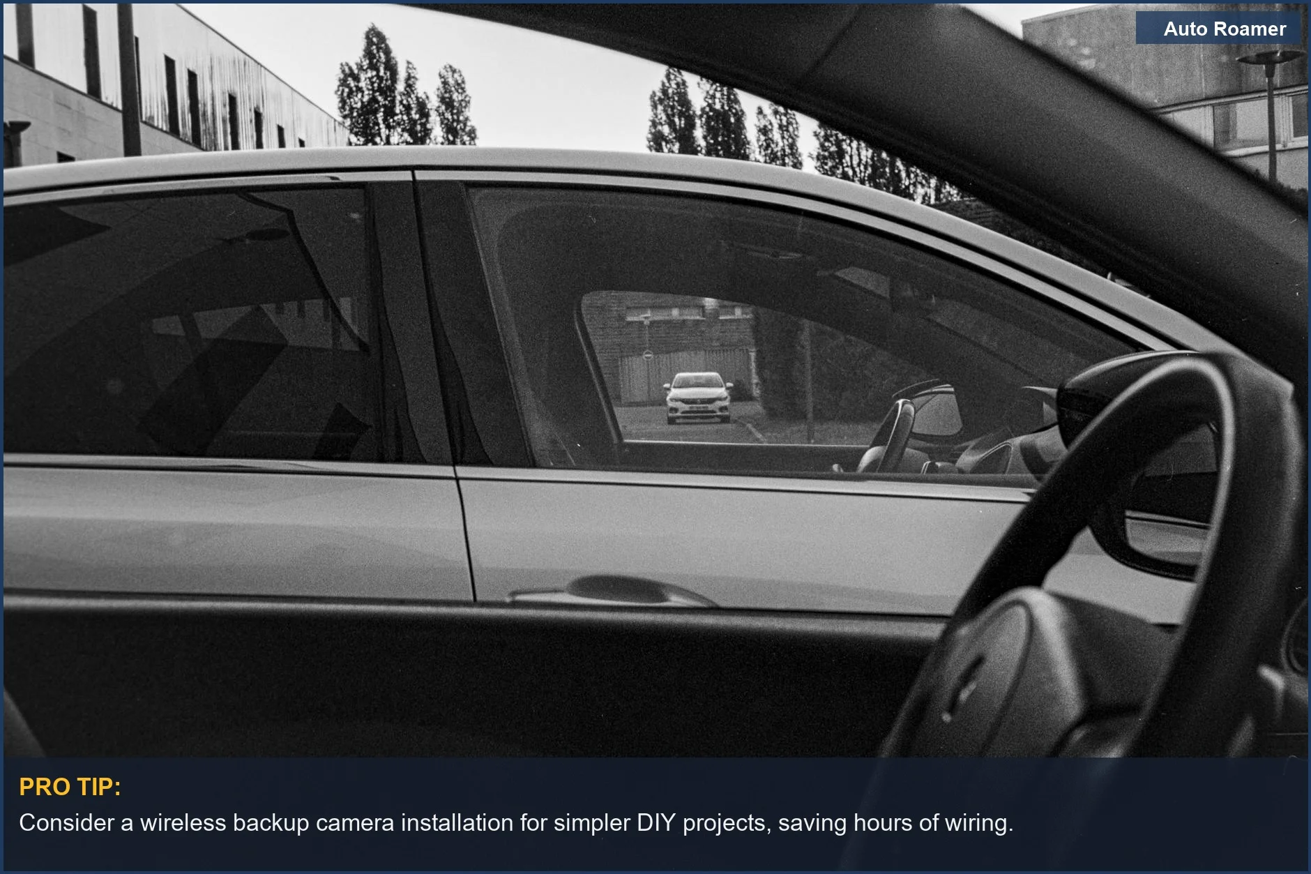 Artistic black and white perspective of a car interior with a street view, highlighting backup camera installation options.