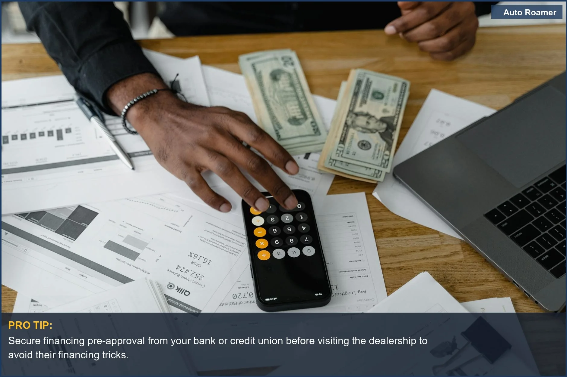 Overhead view of financial documents, calculator, cash, and laptop for financial planning, showing how to avoid dealership financing tricks.
