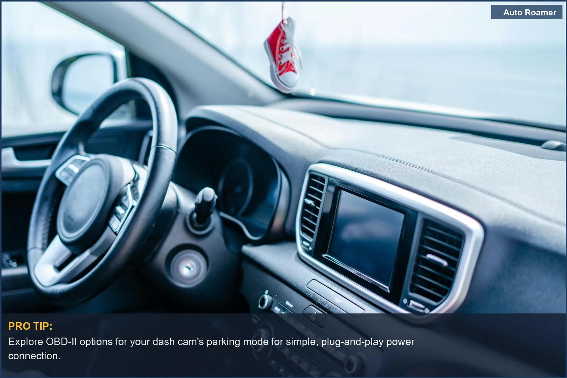 Modern car dashboard interior with focus on steering wheel, ideal for dash cam power source discussion.